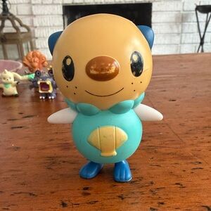 Pokémon Oshawott figure, from the 2011 McDonald's promotional bobble toy set